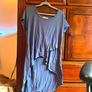 Bluish gray shirt with a long back and a crisscross front